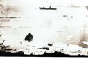 Image of Vessel in distance, small boat on shore